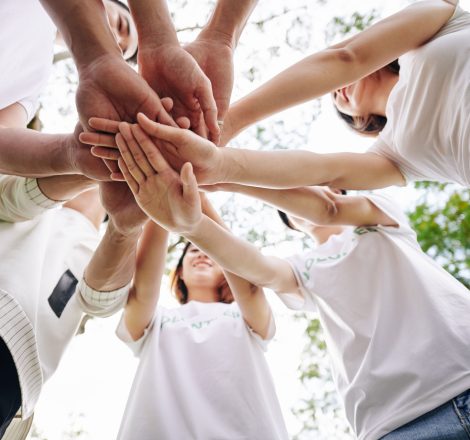 volunteers-showing-support-and-unity-SE9ND4P.jpg